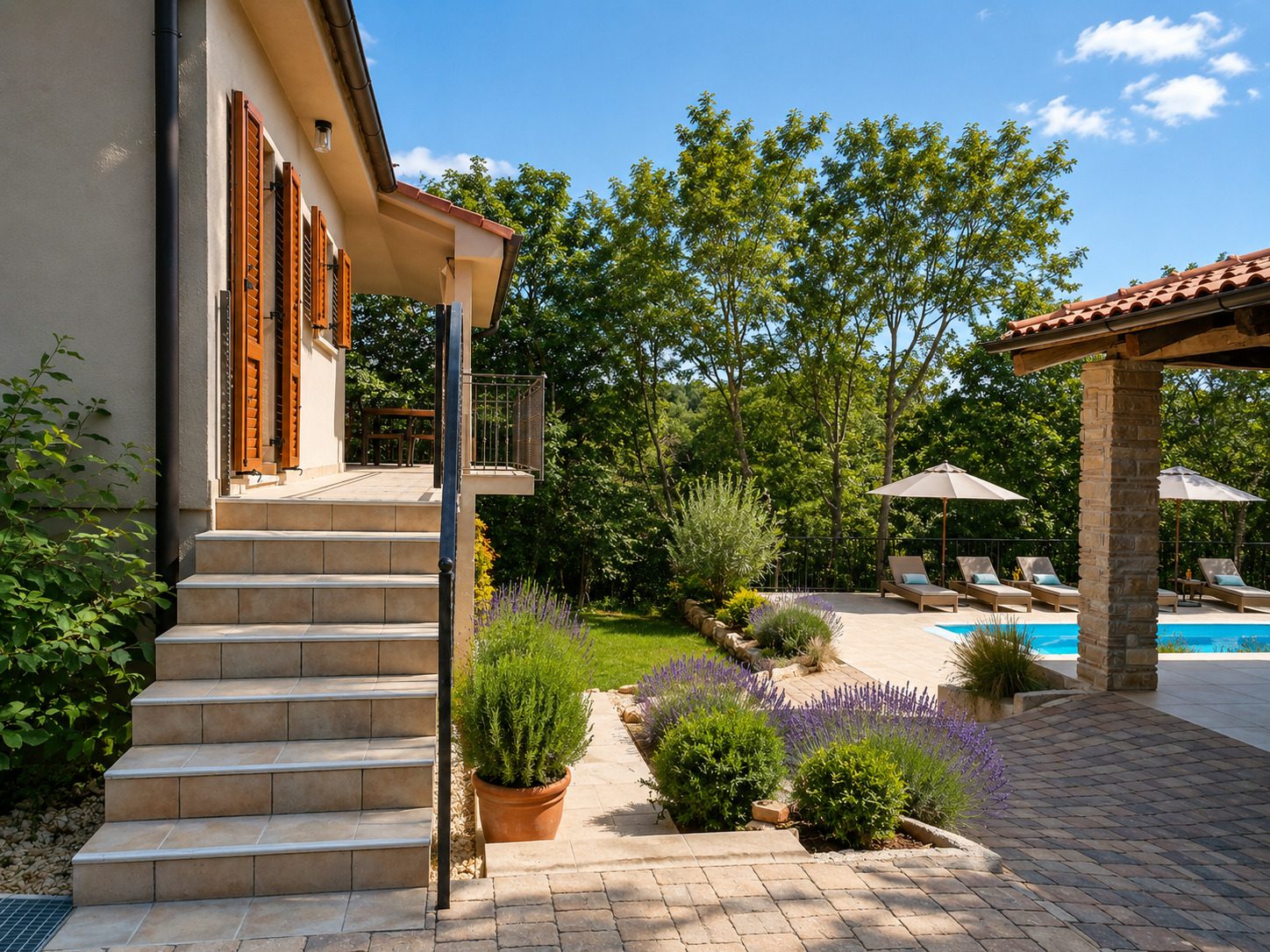 Exterior area of Villa VinoSelo surrounded by vineyards and olive groves